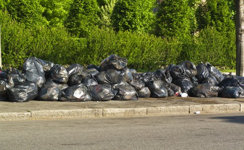 Waste collection trucks navigating Central London traffic